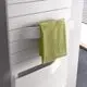 Kermi Badheizkörper Tabeo-E mit grünem Handtuch.